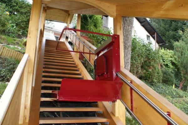 GTLE platform on a wooden staircase